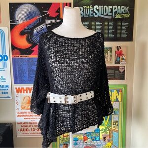 White belt with silver grommets